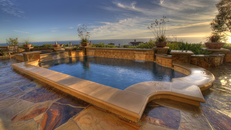 A delicate grecian resting place with elegance whisking one away from the swimming pool oasis on hilltops of Newport Beach, California to the hilltops of the Mediterranean of old.