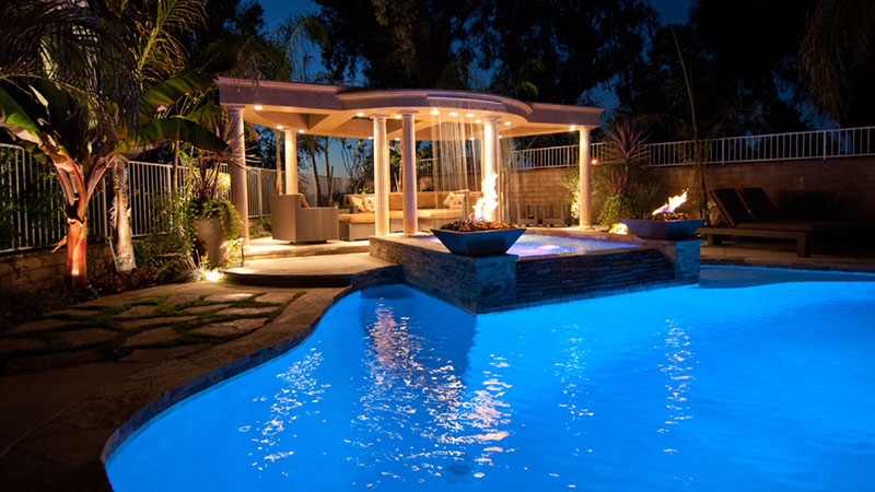 Swimming pool remodel with new built in spa.  Fire, pergola, and outdoor living in grand style, Laguna Hills, California.