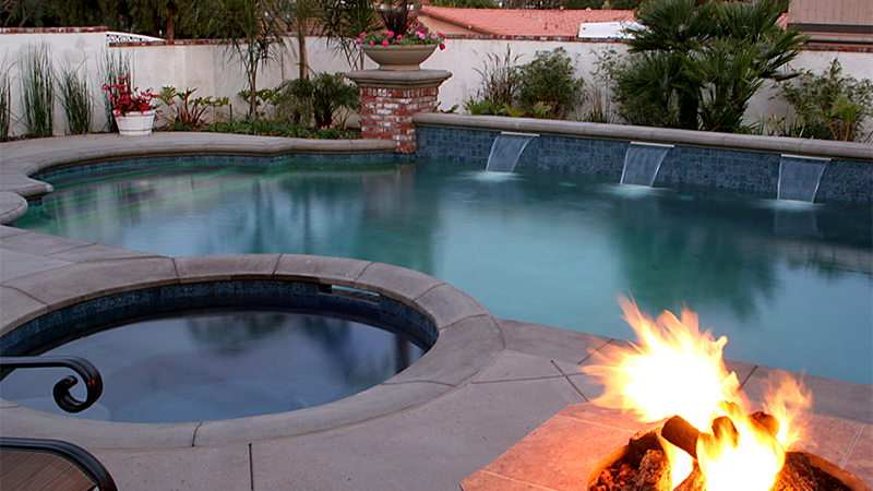 This backyard environment was styled after a classic grecian theme complimenting a newly remodeled 1940's circa mediterranean villa in Newport Beach. Winning Gold at the 2006 APSP International Awards of Excellence, this environment is designed for entertaining a large, extended family highlighted with separate pour cantilever coping in a "Swoop" style for relaxation in the centered spa.