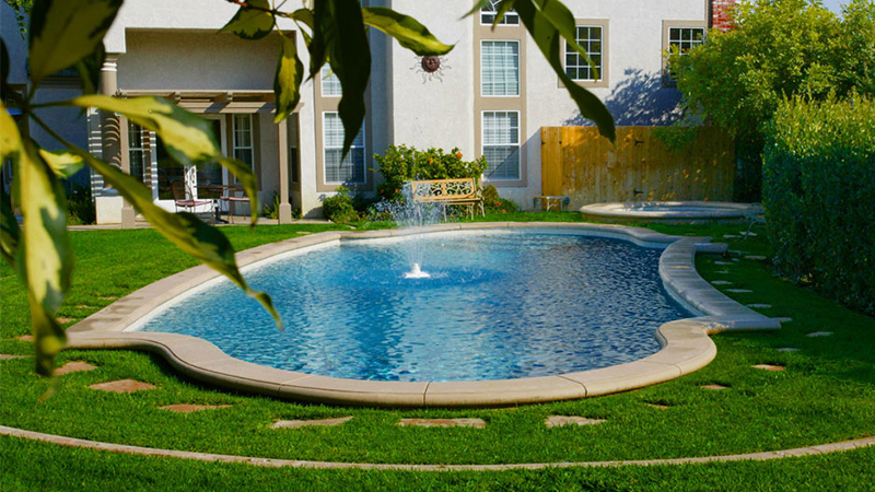 Fountain in the Meadow custom designed swimming pool.  2004 National Spa and Pool Institute.