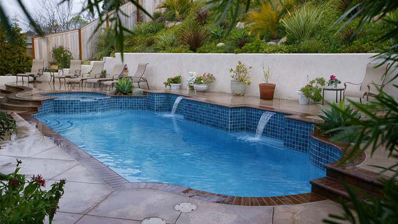 Gentle waterfalls and lounges encompass your raised spa secretly realigning your energies; recovering you from the day.  Tucked away your private spa is awaiting you in your backyard to welcome you home.
