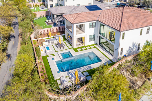 California Outdoor Living with a Swimming Pool and Spa, Firepit Area, BBQ and Outdoor/Indoor Living Environment Complete with Lounge Area